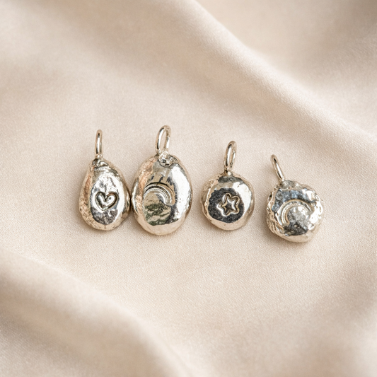 Storyteller Charm - A little symbol with meaning.
